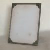 Vintage zilverkleurige fotolijst met rijk versierde hoeken