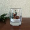 Kaars in glas hertje en kerstbomen