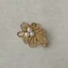 Vintage broche goudkleurig filigraan faux parels