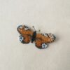 Vintage broche vlinder Dagpauwoog kraaltjes