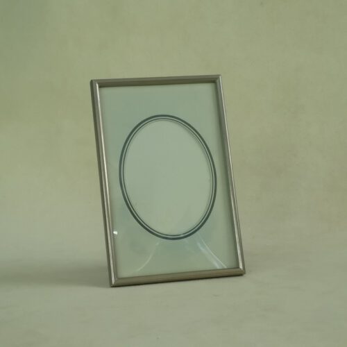 Vintage zilverkleurig fotolijstje bol glas
